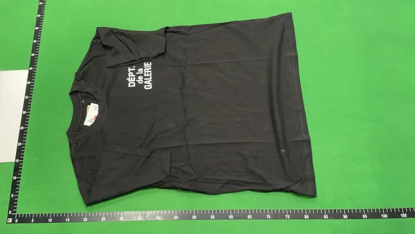 Black Oversized T-Shirt With White Text Print — warehouse QC photo 6