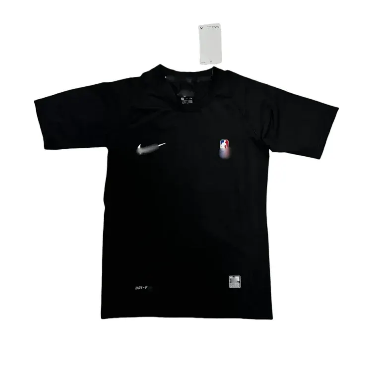 Black Fitted Compression Tee With Chest Emblem — merchant catalogue photo