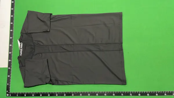 Black Fitted Compression Tee With Chest Emblem — warehouse QC photo 3