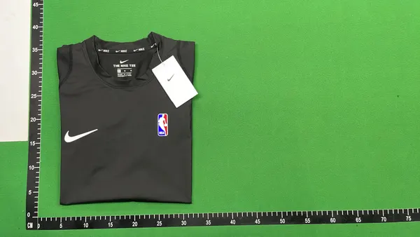 Black Fitted Compression Tee With Chest Emblem — warehouse QC photo 4