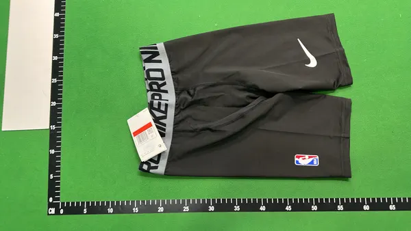 Black Fitted Compression Tee With Chest Emblem — warehouse QC photo 6