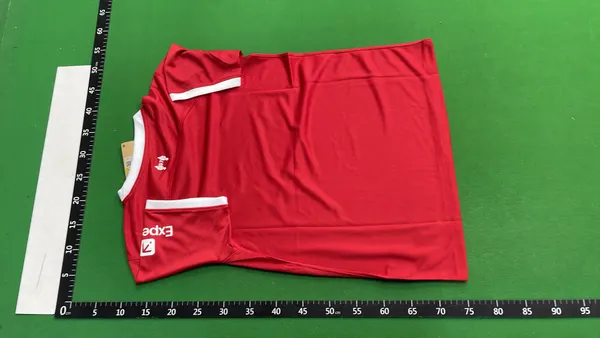 Soccer Jersey With Crest And Sponsor Print — warehouse QC photo 3