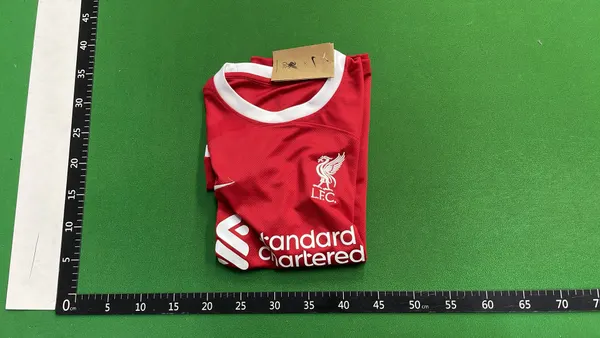 Soccer Jersey With Crest And Sponsor Print — warehouse QC photo 4