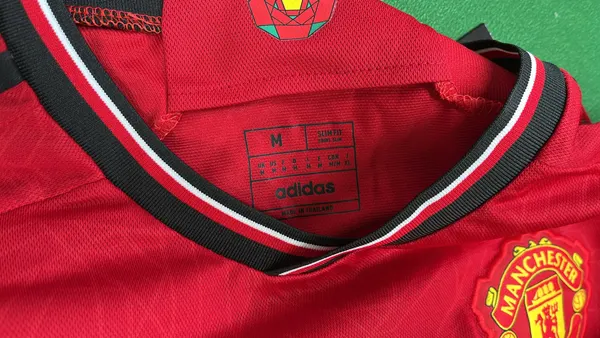 Soccer Jersey With Crest And Sponsor Print — warehouse QC photo 5