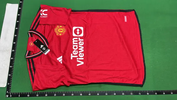 Soccer Jersey With Crest And Sponsor Print — warehouse QC photo 6
