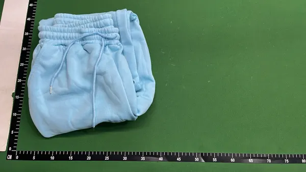 Grey Raglan Hoodie With White Hood Lining — warehouse QC photo 4