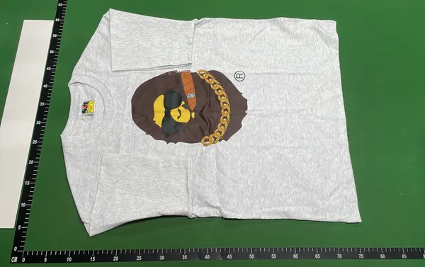 Black T-Shirt With Cartoon Face Graphic Print (Purple) — warehouse QC photo 2