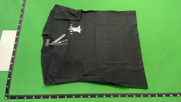 Black Oversized T-Shirt With Block Letter Print — warehouse QC photo 2