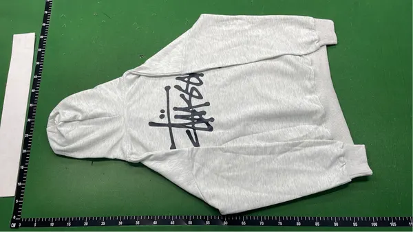 Black Hoodie With White Script Back Print — warehouse QC photo 3