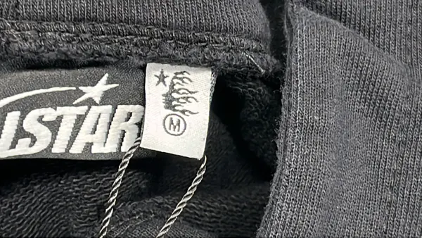 Washed Black Graphic Print Pullover Hoodie — warehouse QC photo 1