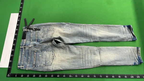 Distressed Skinny Jeans With Ripped Knees (30–38) — warehouse QC photo 3
