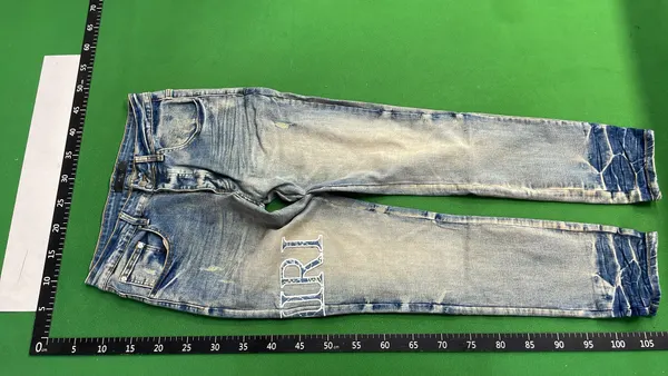 Distressed Skinny Jeans With Ripped Knees (#4) — warehouse QC photo 2