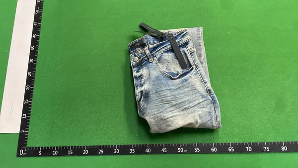 Distressed Skinny Jeans With Ripped Knees (#4) — warehouse QC photo 4
