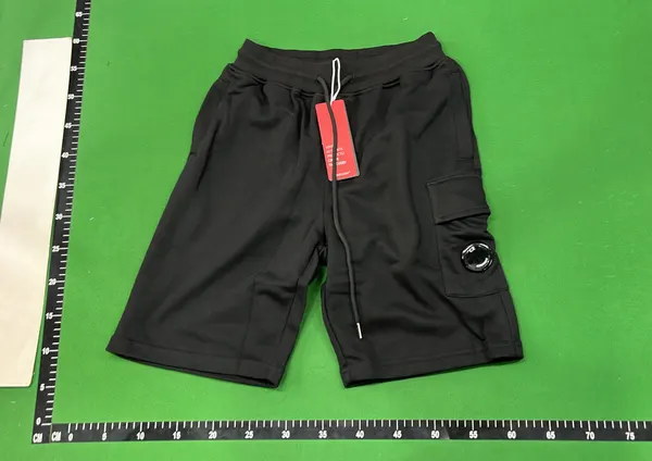 Drawstring Sweat Shorts With Lens Pocket Detail — warehouse QC photo 6