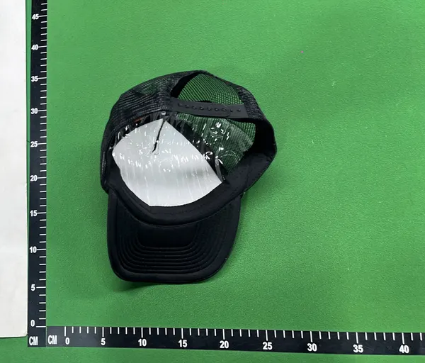 Black Mesh Trucker Cap With Painted Floral Detail — warehouse QC photo 3