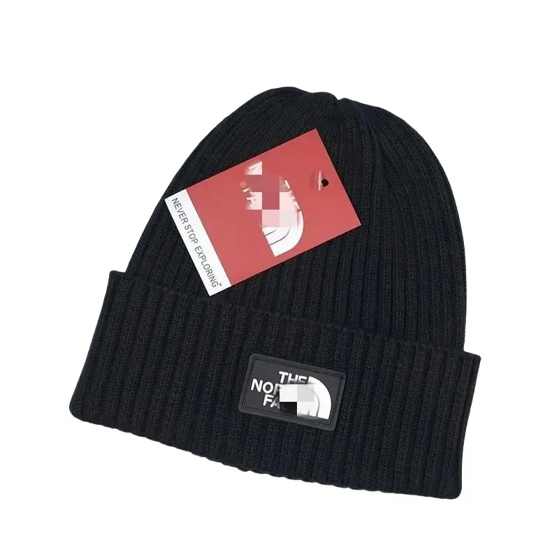 Navy Ribbed Beanie With Rubber Logo Patch — merchant catalogue photo
