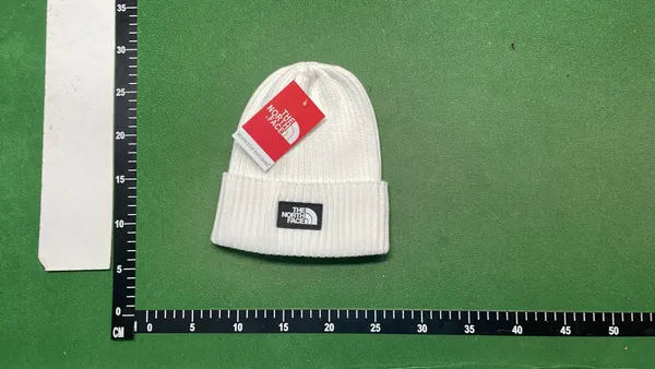 Navy Ribbed Beanie With Rubber Logo Patch — warehouse QC photo 1