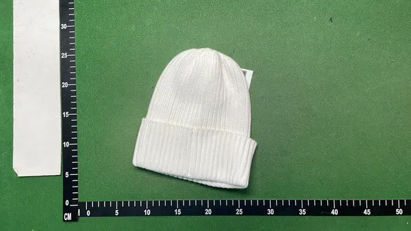 Navy Ribbed Beanie With Rubber Logo Patch — warehouse QC photo 2