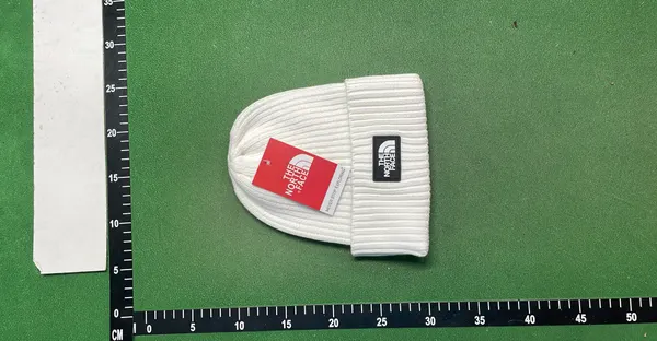 Navy Ribbed Beanie With Rubber Logo Patch — warehouse QC photo 3