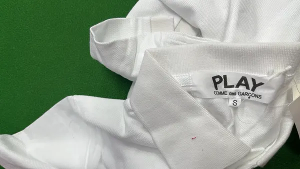 Cotton Polo Shirt With Red Heart Chest Patch — warehouse QC photo 5