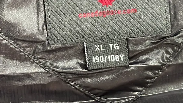 Lightweight Quilted Down Vest With Stand Collar — warehouse QC photo 1