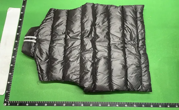 Lightweight Quilted Down Vest With Stand Collar — warehouse QC photo 3