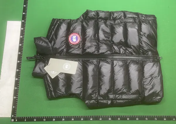 Lightweight Quilted Down Vest With Stand Collar — warehouse QC photo 6