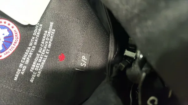 Black Quilted Sleeveless Puffer Vest — warehouse QC photo 1