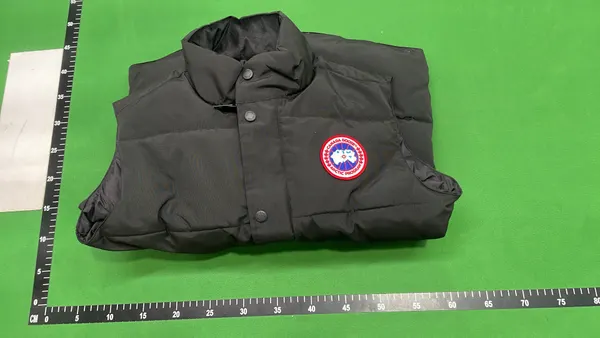 Black Quilted Sleeveless Puffer Vest — warehouse QC photo 4