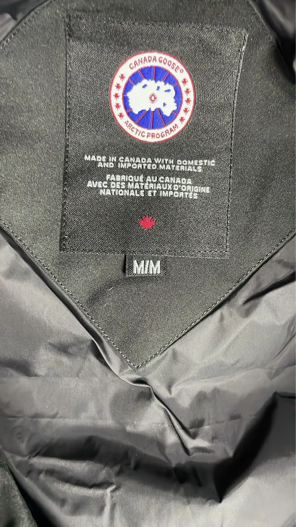 Black Quilted Sleeveless Puffer Vest — warehouse QC photo 5