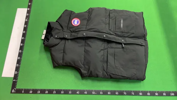 Black Quilted Sleeveless Puffer Vest — warehouse QC photo 6