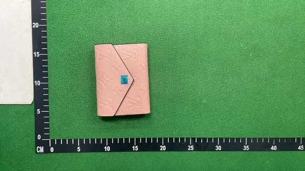 Pink Embossed Monogram Compact Flap Wallet — warehouse QC photo 4