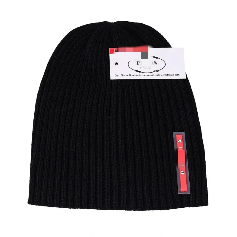 Black Ribbed Knit Beanie With Side Tab — merchant catalogue photo