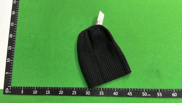 Black Ribbed Knit Beanie With Side Tab (White) — warehouse QC photo 2