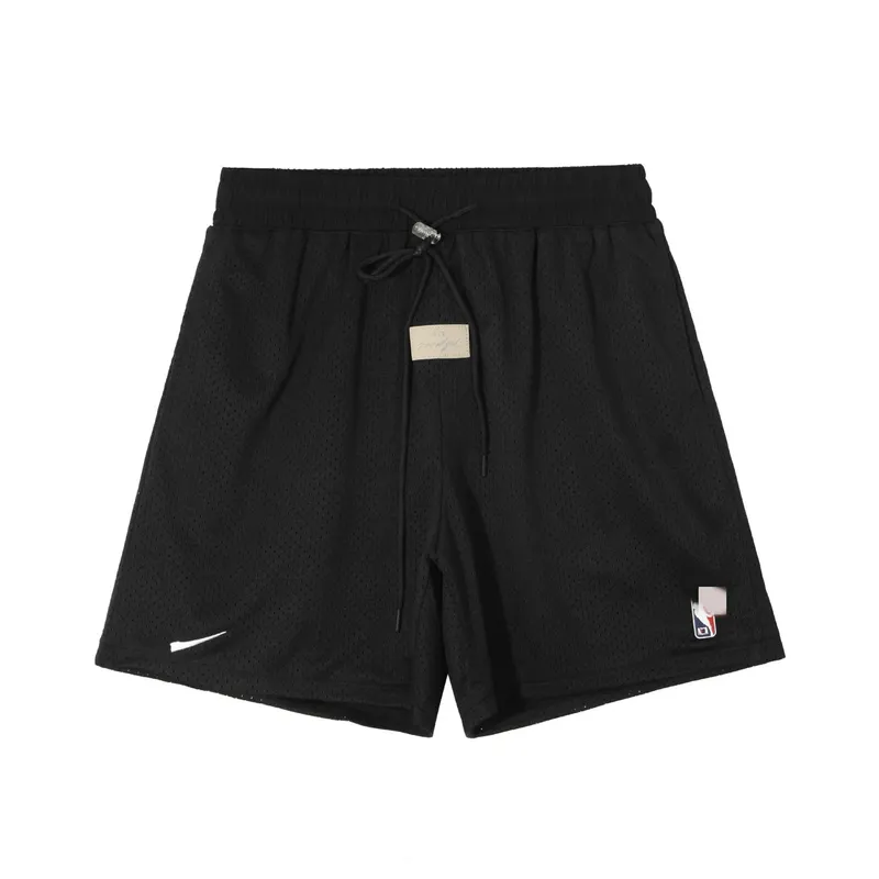 Black Mesh Drawstring Shorts With Woven Label (Beige) — merchant catalogue photo