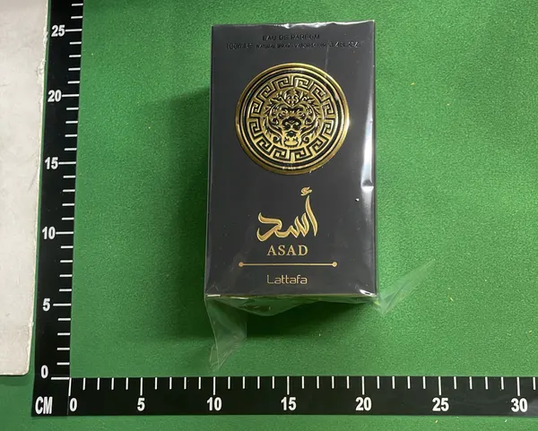 Black And Gold Eau De Parfum Bottle — warehouse QC photo 1