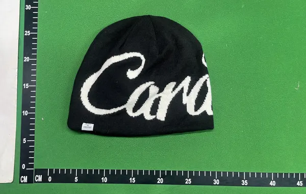 Black Knit Beanie With Script Lettering — warehouse QC photo 2