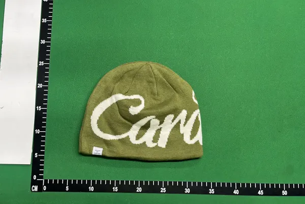 Black Knit Beanie With Script Lettering — warehouse QC photo 5