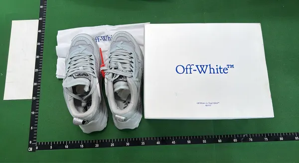 Cream Chunky Trail Sneakers With Arrow Print — warehouse QC photo 1