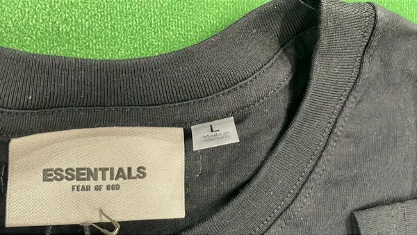 White Relaxed Tee With Small Chest Wordmark — warehouse QC photo 1