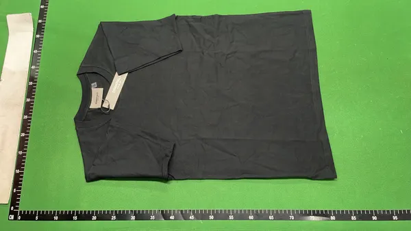 White Relaxed Tee With Small Chest Wordmark — warehouse QC photo 6