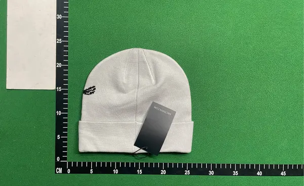 Black Jacquard Knit Cuffed Beanie — warehouse QC photo 5