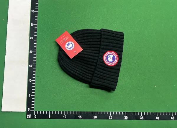Black Ribbed Knit Beanie With Circular Patch — warehouse QC photo 3
