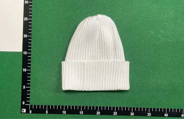 Black Ribbed Beanie With Square Woven Patch — warehouse QC photo 2