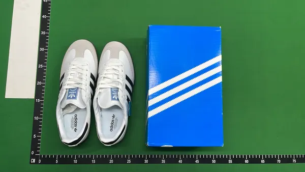 Black Leather Low-Profile Gum Sole Sneakers — warehouse QC photo 1