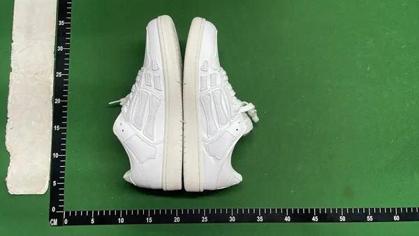 Low-Top Sneakers With Bone-Shaped Side Panels — warehouse QC photo 4