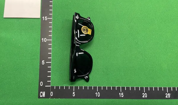 Black Square Sunglasses With Green Tinted Lenses — warehouse QC photo 6