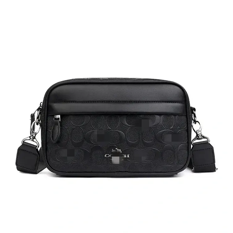 Black Embossed Crossbody Bag With Webbing Strap — merchant catalogue photo