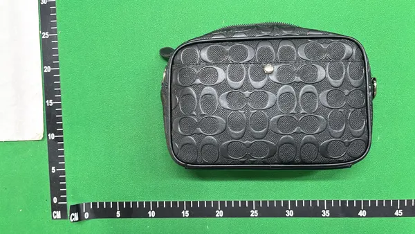 Black Embossed Crossbody Bag With Webbing Strap — warehouse QC photo 2