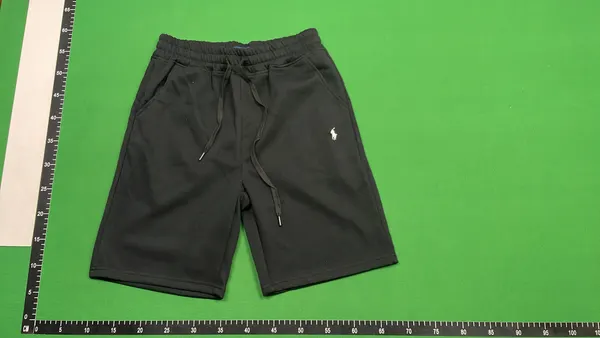 Assorted Embroidered-Emblem Fleece Sweat Shorts — warehouse QC photo 2